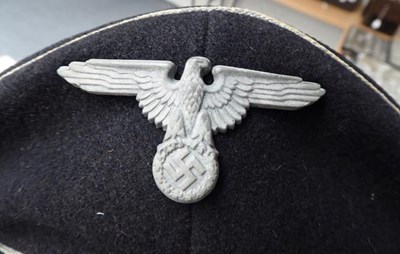 Lot 71 - A German Third Reich SS Officer's Visor Cap,...