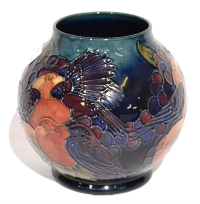 Lot 17 - A William John Moorcroft Finches Pattern Vase, on a blue ground, impressed factory marks and...