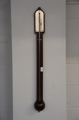 Lot 1235 - A Georgian mahogany stick barometer with...