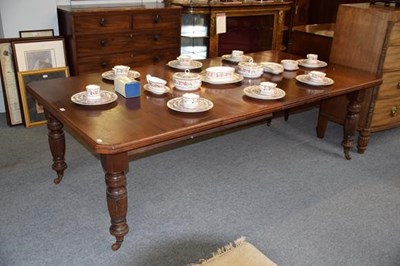 Lot 1246 - A Victorian walnut wind out dining table with...