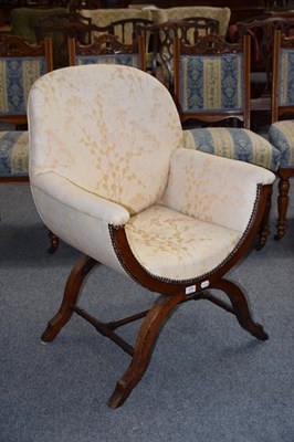 Lot 1250 - A Victorian upholstered tub armchair with...