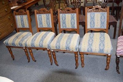 Lot 1255 - A set of four early 20th century carved oak...