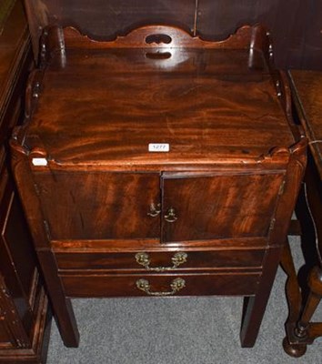 Lot 1277 - A George III mahogany tray top commode raised...