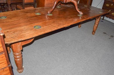 Lot 1283 - An 18th century pine plank top kitchen table...