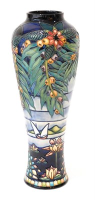 Lot 41 - A Modern Moorcroft Serendipity Pattern Vase, designed by Nicola Slaney, on a dark ground, impressed