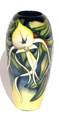 Lot 57 - A Modern Moorcroft Sesquipendale Orchid Pattern 101/7 Vase, designed by Emma Bossons, impressed and