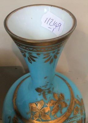 Lot 133 - A Victorian painted and gilt blue glass vase...