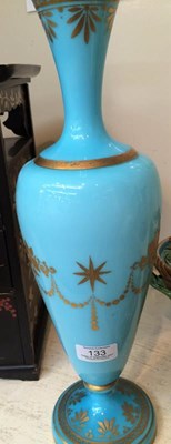 Lot 133 - A Victorian painted and gilt blue glass vase...