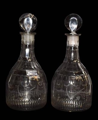 Lot 160 - A pair of early 19th century glass decanters,...