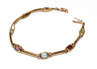 Lot 193 - A 9 carat gold multi gem set bracelet, length...