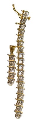 Lot 207 - An articulated diamond pendant, length 2.8cm...
