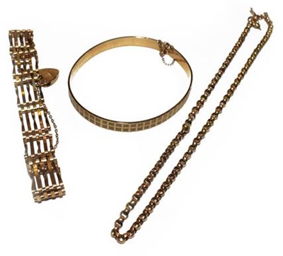 Lot 216 - A gate link bracelet with a 9 carat gold heart...