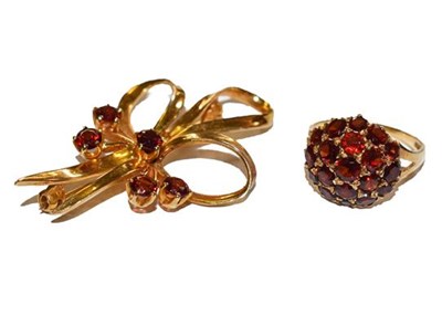 Lot 223 - A 9 carat gold garnet brooch, length 4.9cm and...
