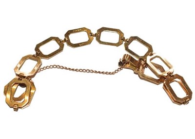 Lot 248 - A fancy link bracelet, stamped '9CT', length...