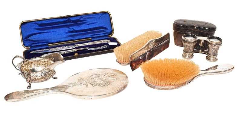 Lot 27 - A silver mounted four-piece vanity set by...