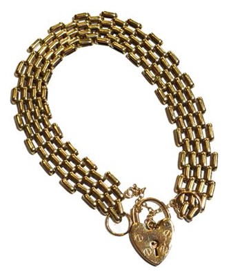 Lot 276 - A 9 carat gold gate link bracelet, length 18.5cm