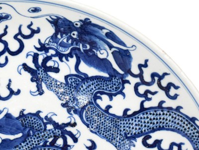 Lot 30 - A 19th century Chinese blue and white dish,...
