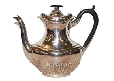 Lot 313 - An Edward VII silver coffee pot by Goldsmiths...