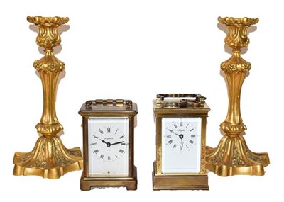 Lot 350 - A pair of gilt bronze candlesticks with...