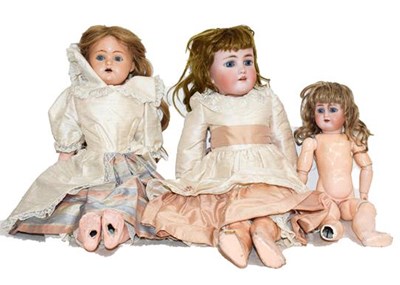 Lot 366 - Two rocking eye bisque head dolls stamped...