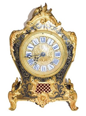 Lot 371 - A French boulle striking mantle clock, the...