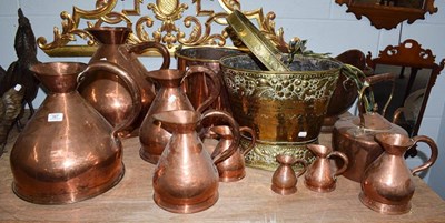 Lot 387 - A set of eight 19th century copper measuring...