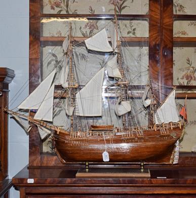 Lot 401 - A model of a three masted ship, 78cm total length