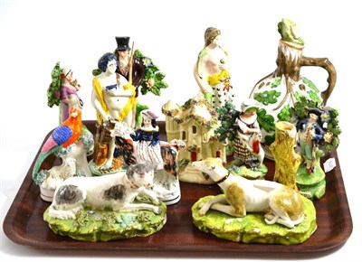 Lot 96 - Eleven Staffordshire figures and a Continental jar and cover