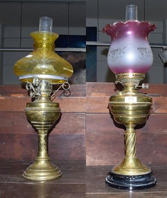 Lot 414 - Two Victorian brass based oil lamps (2)