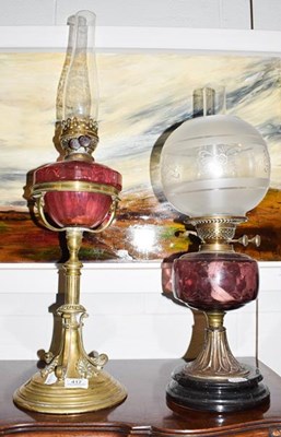 Lot 417 - A Victorian brass based oil lamp with...