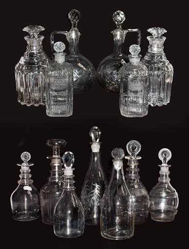 Lot 56 - A pair of cut glass decanters engraved...