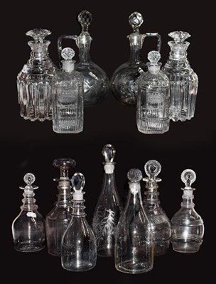 Lot 56 - A pair of cut glass decanters engraved...