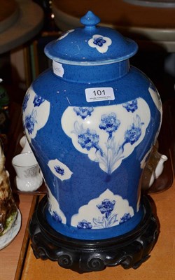 Lot 101 - A William Moorcroft late Florian forget-me-not panels ginger jar and cover, circa 1918, on a powder