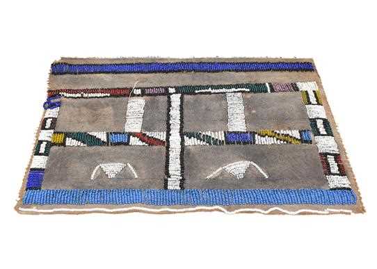Lot 67 - A Zulu Modesty beaded apron on a canvas backing