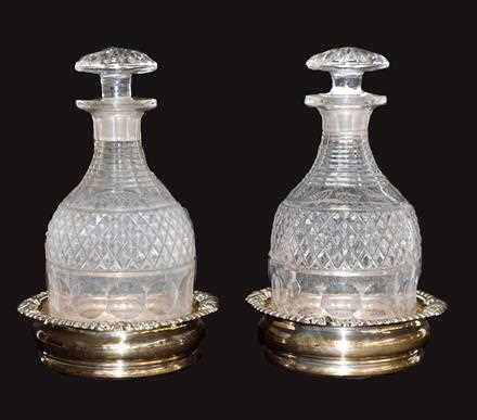 Lot 73 - A pair of Old Sheffield plate decanter stands...