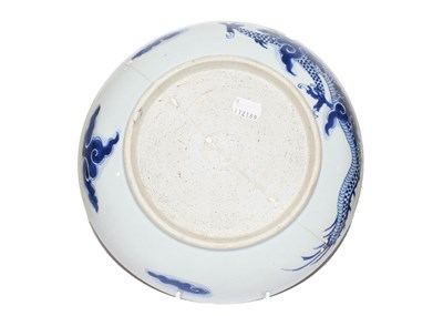 Lot 87 - A Chinese Kangxi blue and white bowl painted...