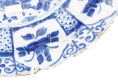 Lot 98 - An 18th century English Delft blue and white...