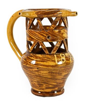 Lot 106 - A Halifax Slipware Puzzle Jug, dated 1873, of...