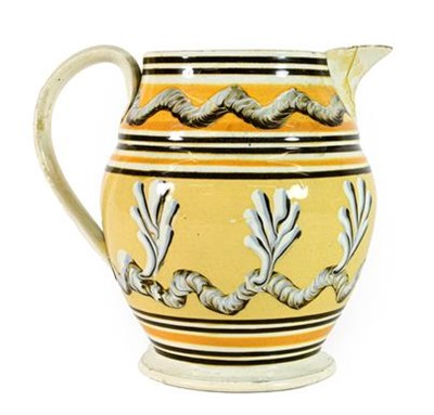 Lot 140 - A Mocca Ware Jug, early 19th century, of ovoid...