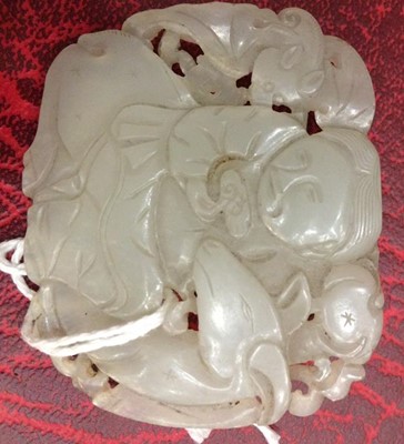 Lot 216 - A Chinese Jade Pendant, of oval form, carved...