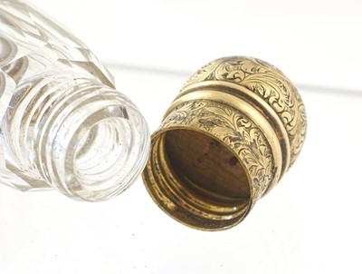 Lot 44 - A Victorian Gilt-Metal Mounted Cut-Glass Scent-...