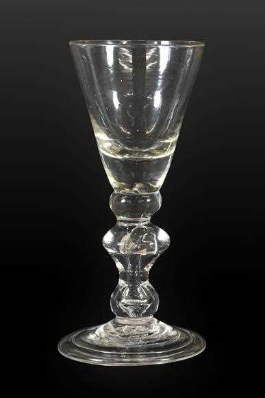 Lot 66 - A Wine Glass, circa 1720, the conical bowl...