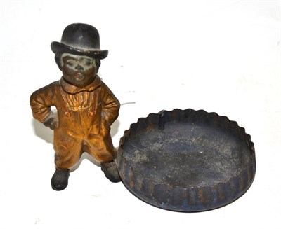 Lot 140 - A gilt painted and metal 'nodding head' novelty ashtray