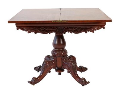 Lot 642 - A Victorian Carved Mahogany Foldover Tea Table,...