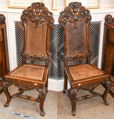 Lot 654 - A Pair of William & Mary Style Carved Walnut...