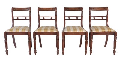 Lot 661 - A Set of Six (5+1) Carved Mahogany Dining...