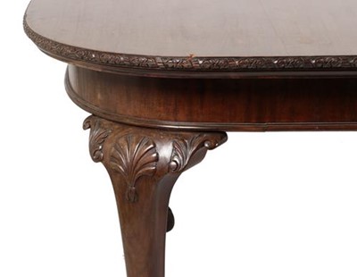 Lot 670 - A Late 19th Century Carved Mahogany Extending...