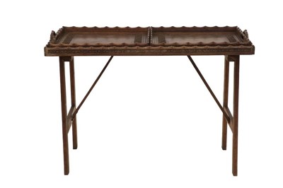 Lot 719 - An Anglo-Indian Carved Hardwood Folding Table,...