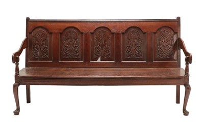Lot 765 - A Joined Oak Settle, the back support with...