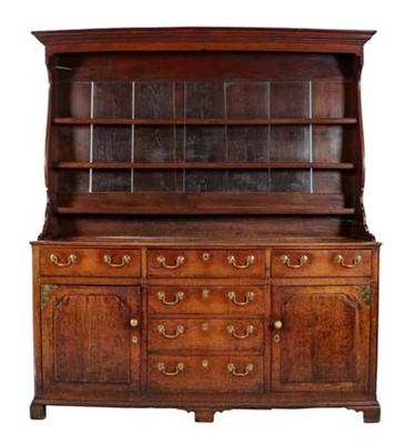 Lot 770 - A George III Oak Enclosed Dresser and Rack,...